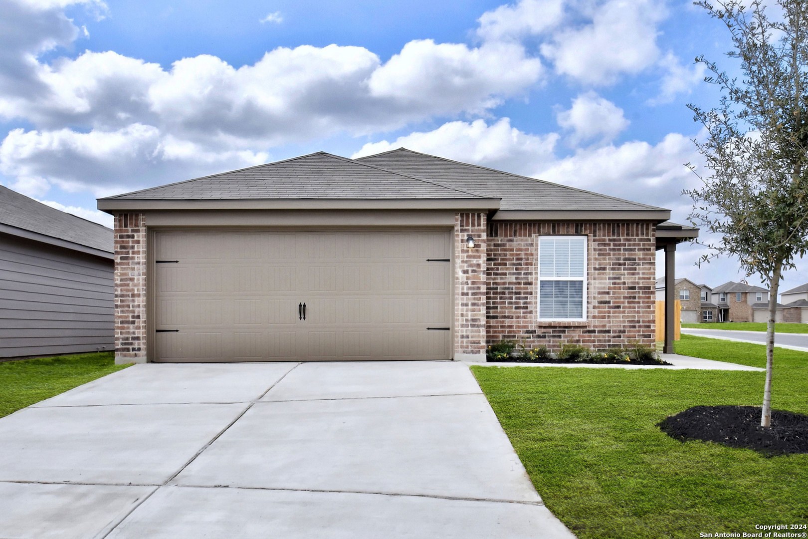 a front view of house with yard