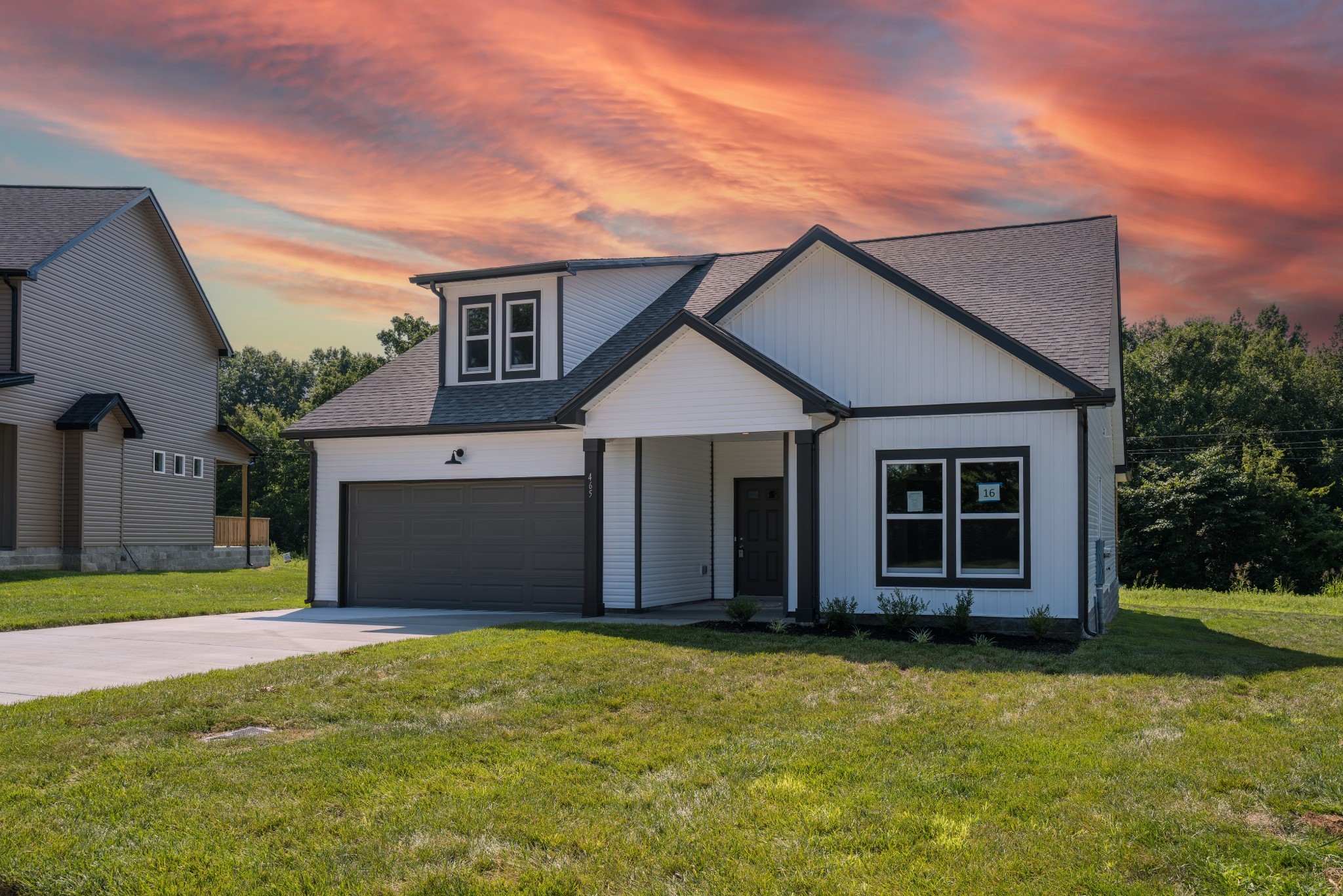 front view of a house with a yard