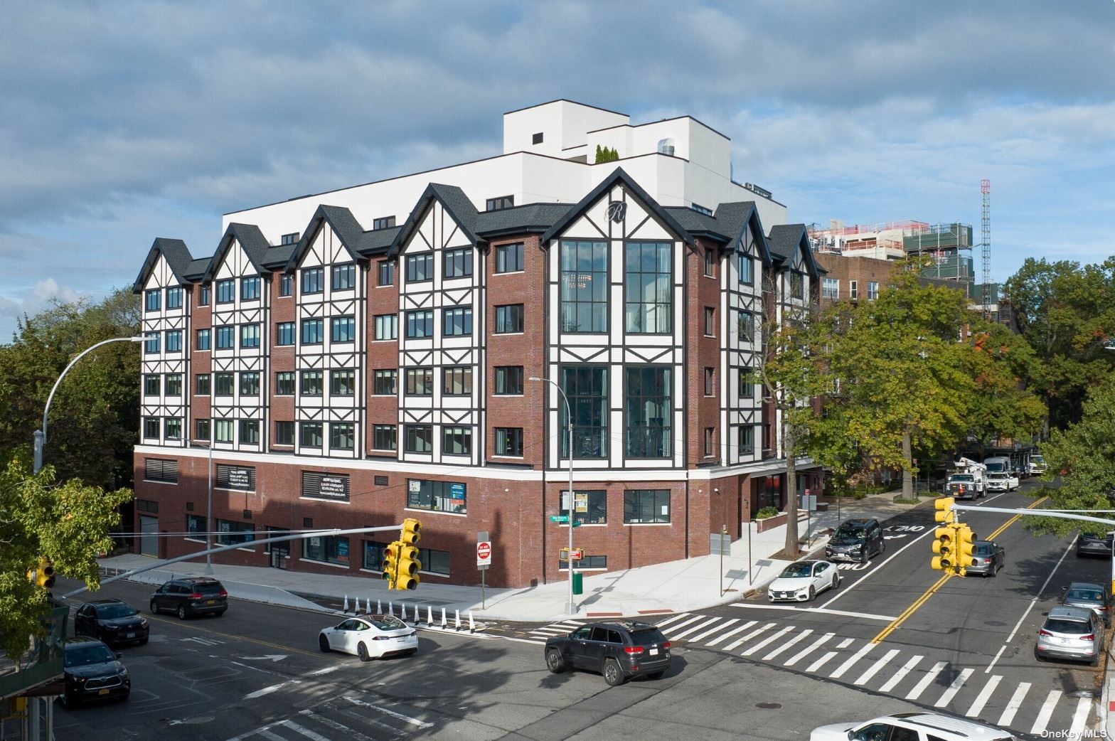 a front view of a building with street view