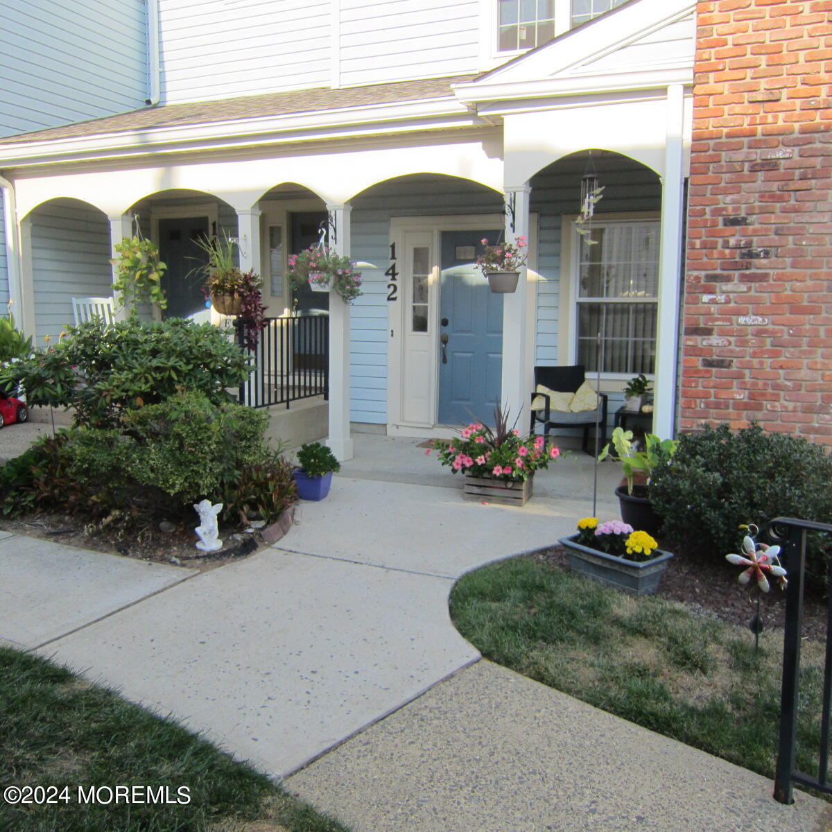 a front view of a house with outdoor space porch and livingroom