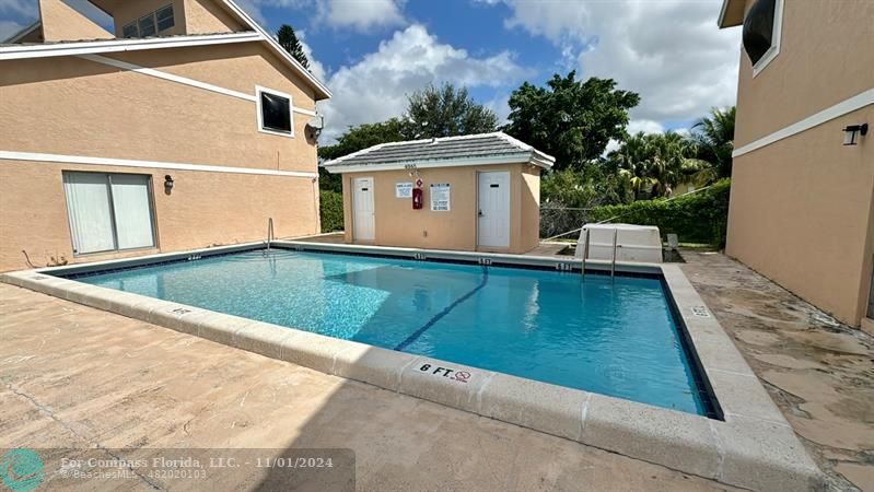 a view of house with backyard space