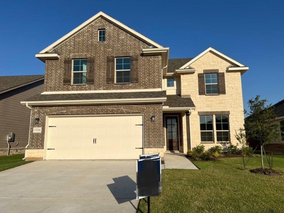 a front view of house with yard