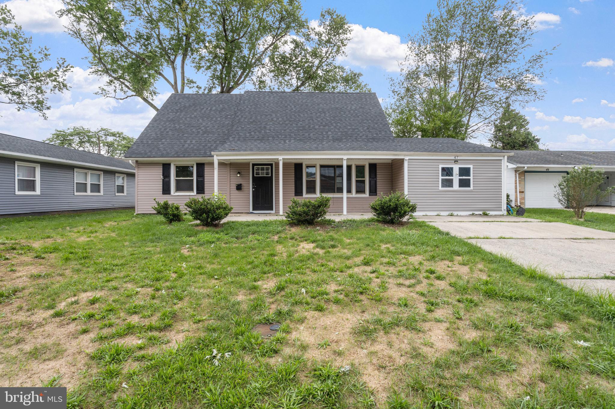 front view of house with a yard