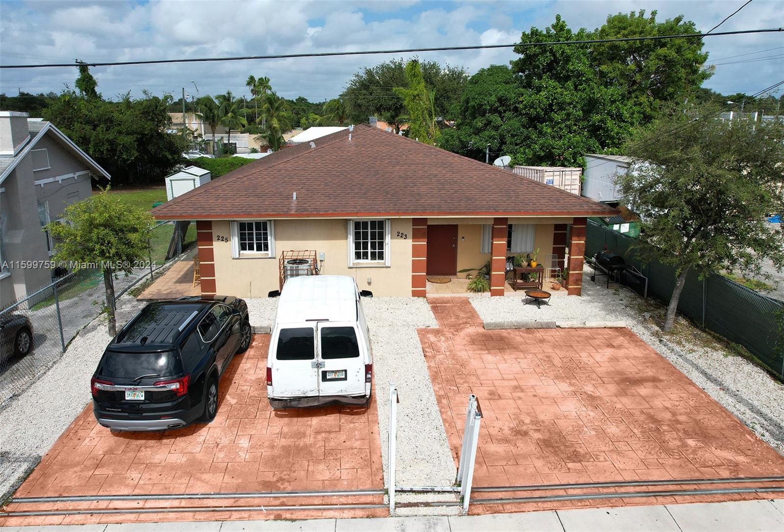 a car parked in front of a house