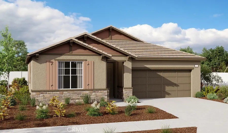 a front view of a house with garage