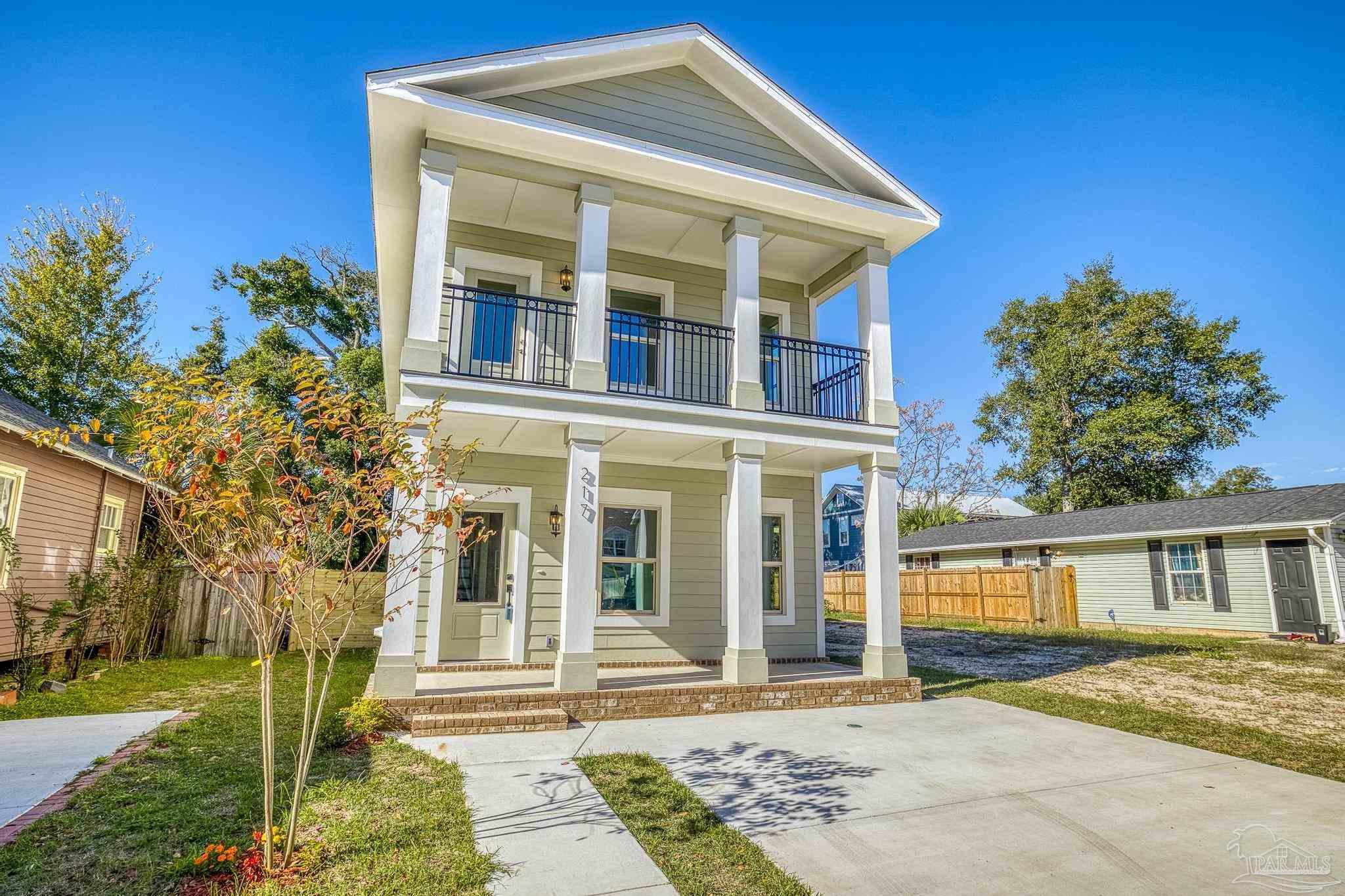 2-car driveway, covered front porch, brick steps