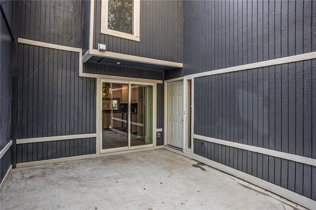 a view of backyard with large window