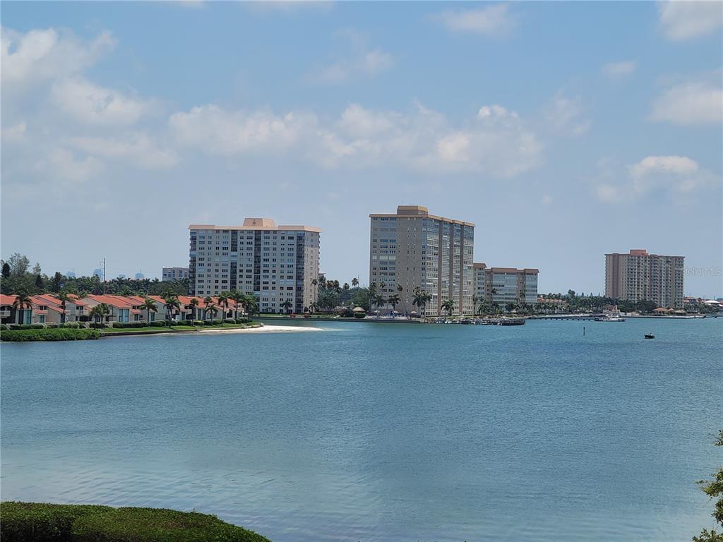 a view of a city that has tall buildings in the background