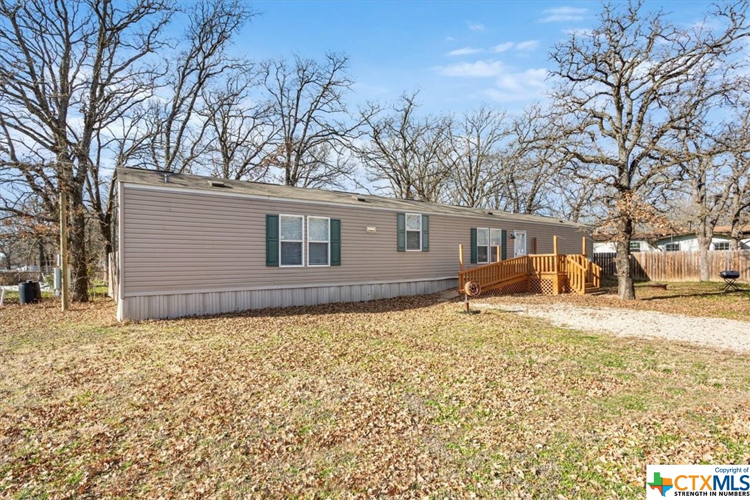 a house with trees in front of it