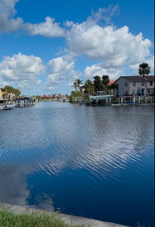 a view of a lake from a city