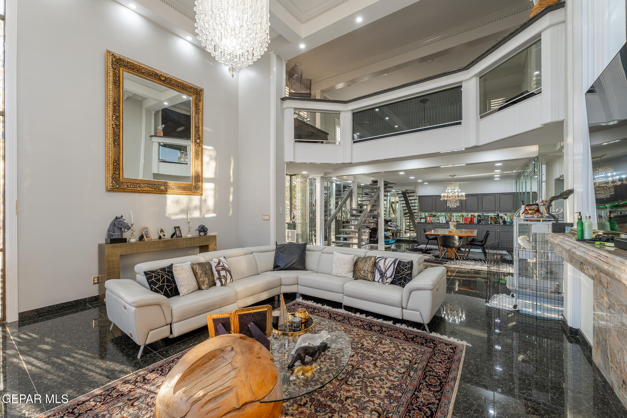 a living room with furniture and a couch