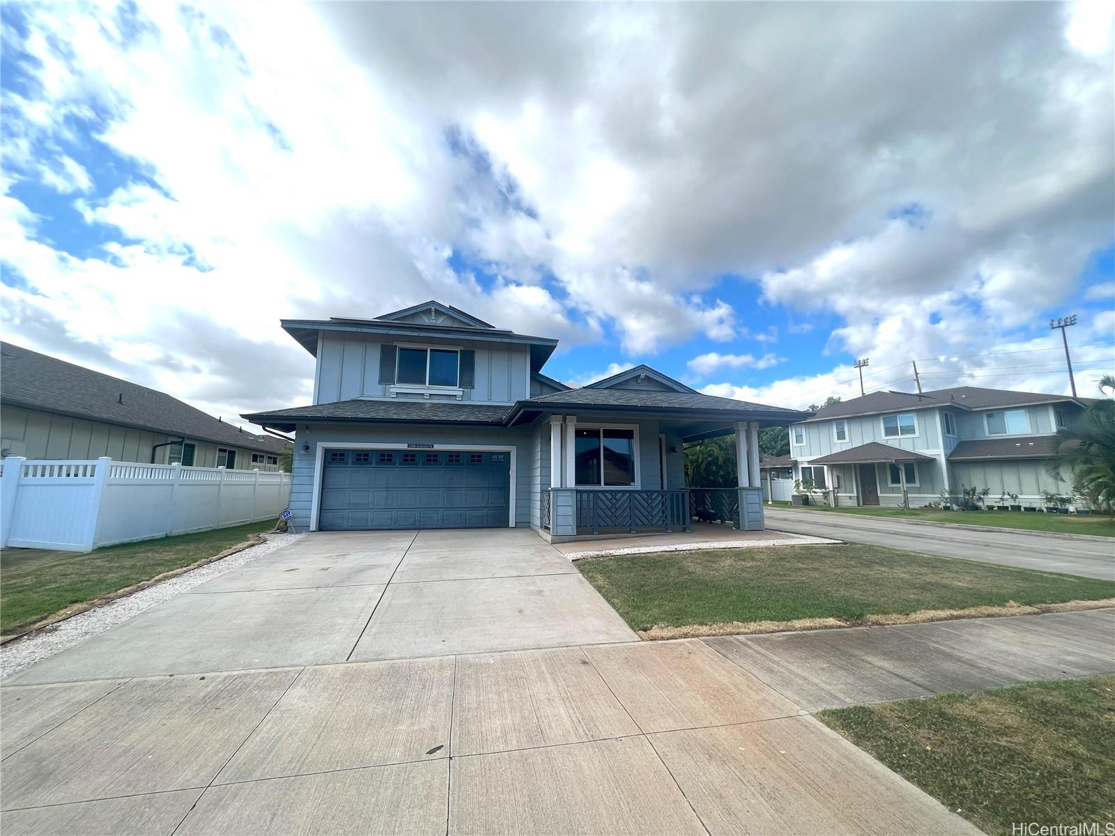 a view of house with yard and entertaining space