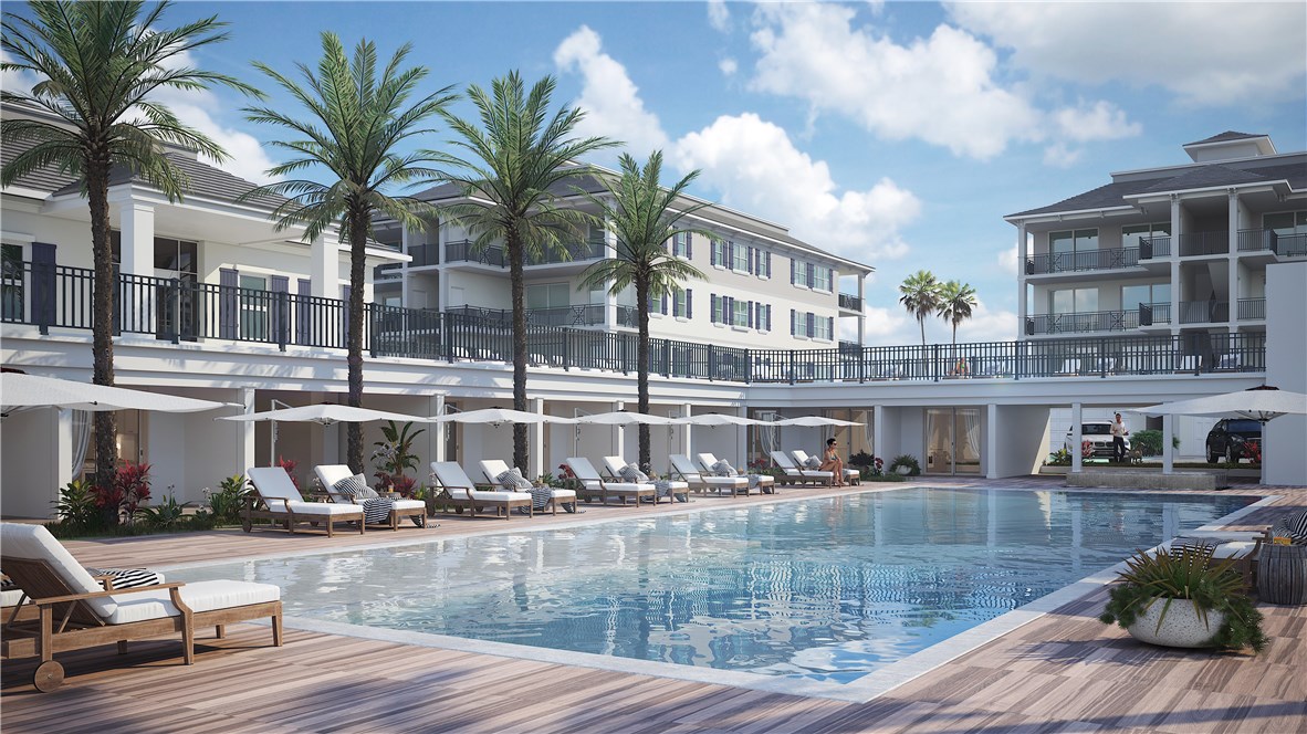 a view of a swimming pool with a lounge chairs