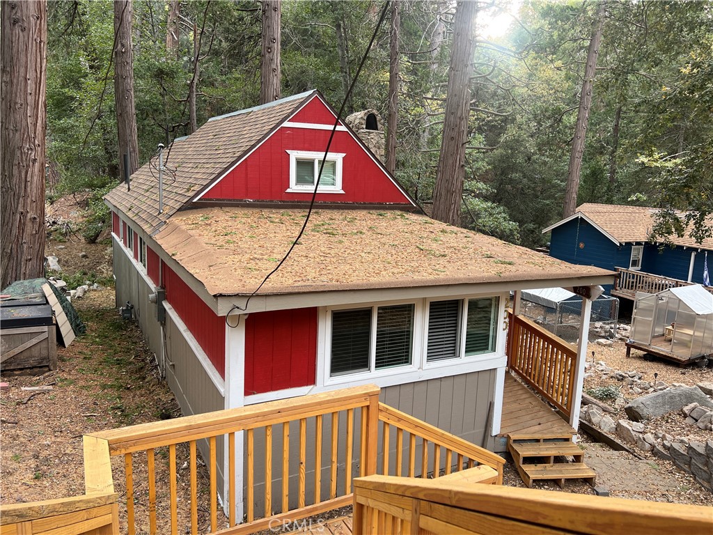 a view of a house with a roof deck