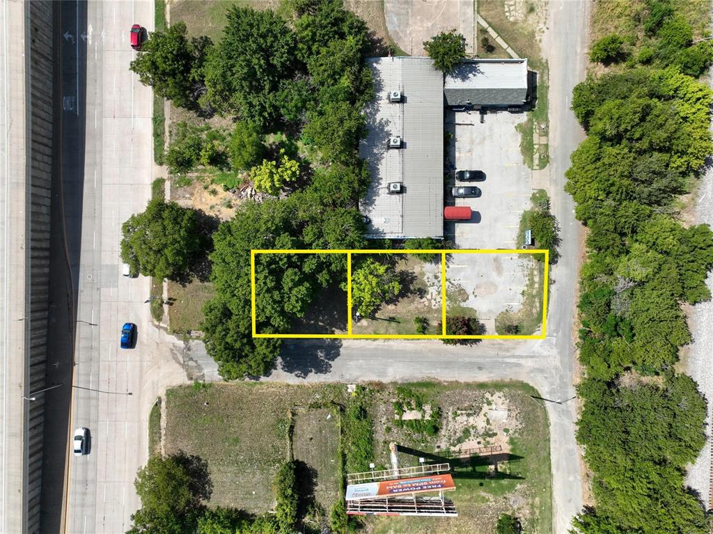 an aerial view of a house with outdoor space