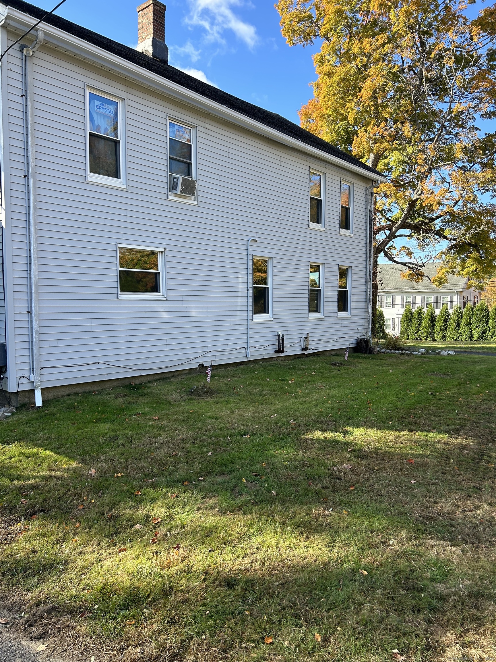 a view of a house with a yard