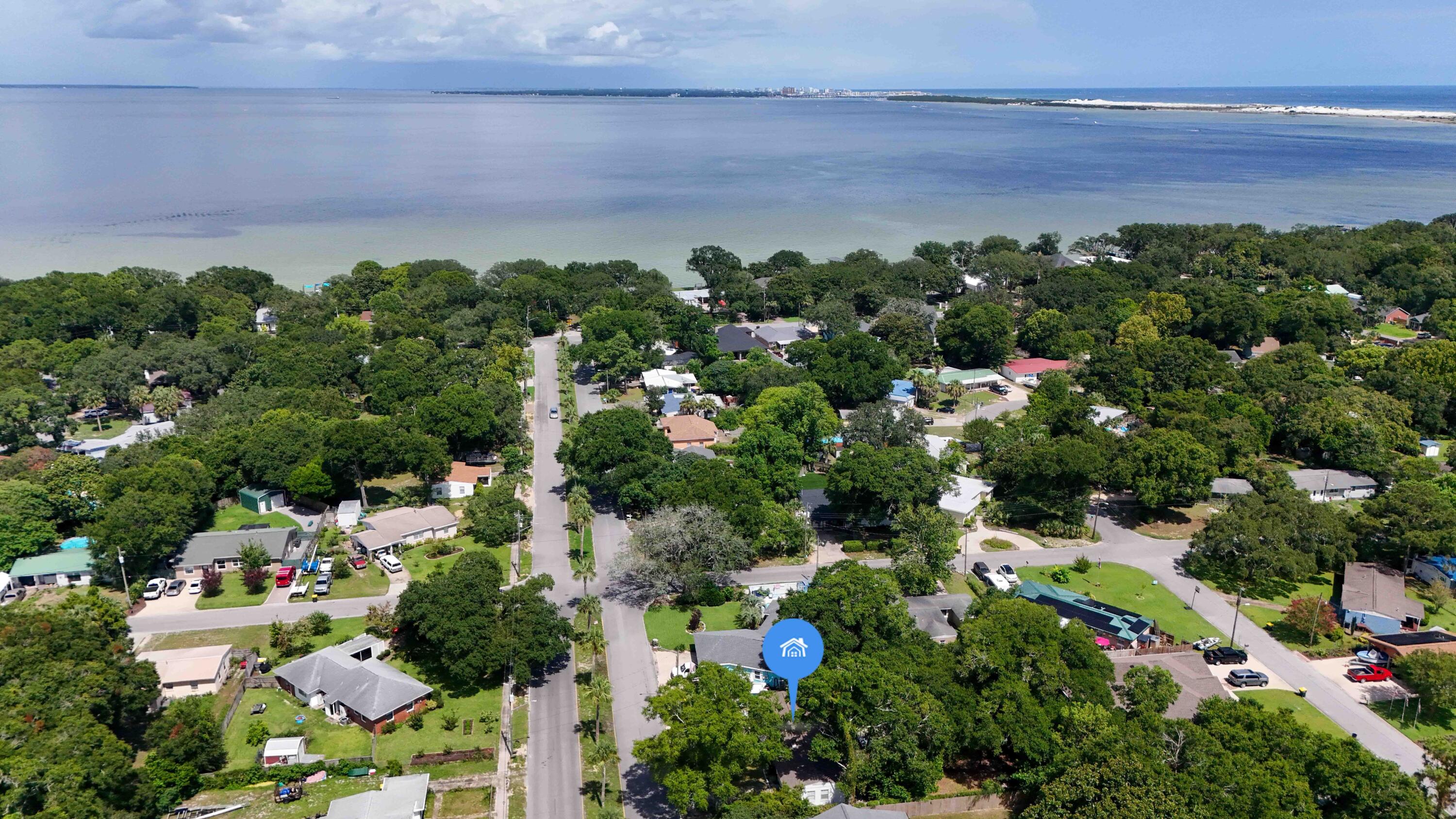 a view of a city and green space