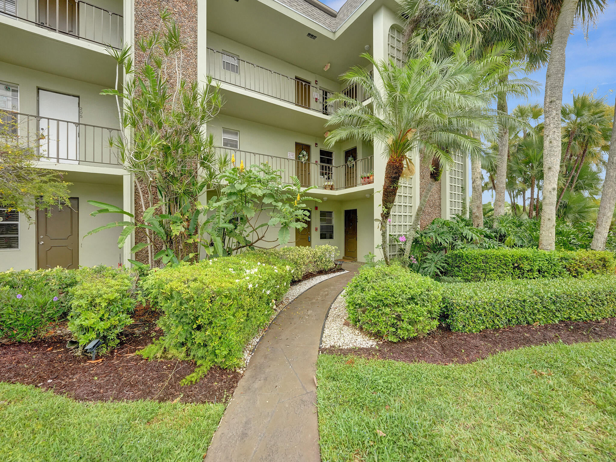 a front view of a multi story residential apartment building