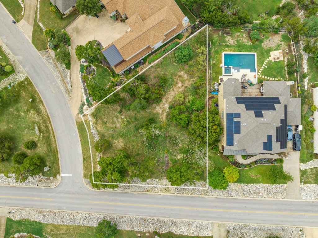 a backyard of a house with lots of green space