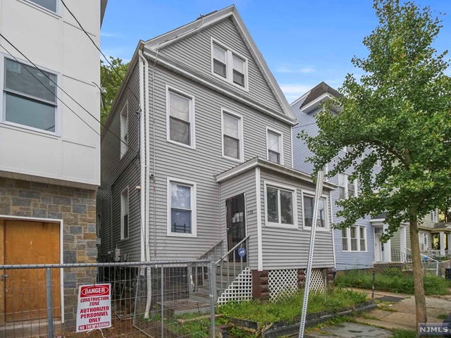 a front view of a house with balcony