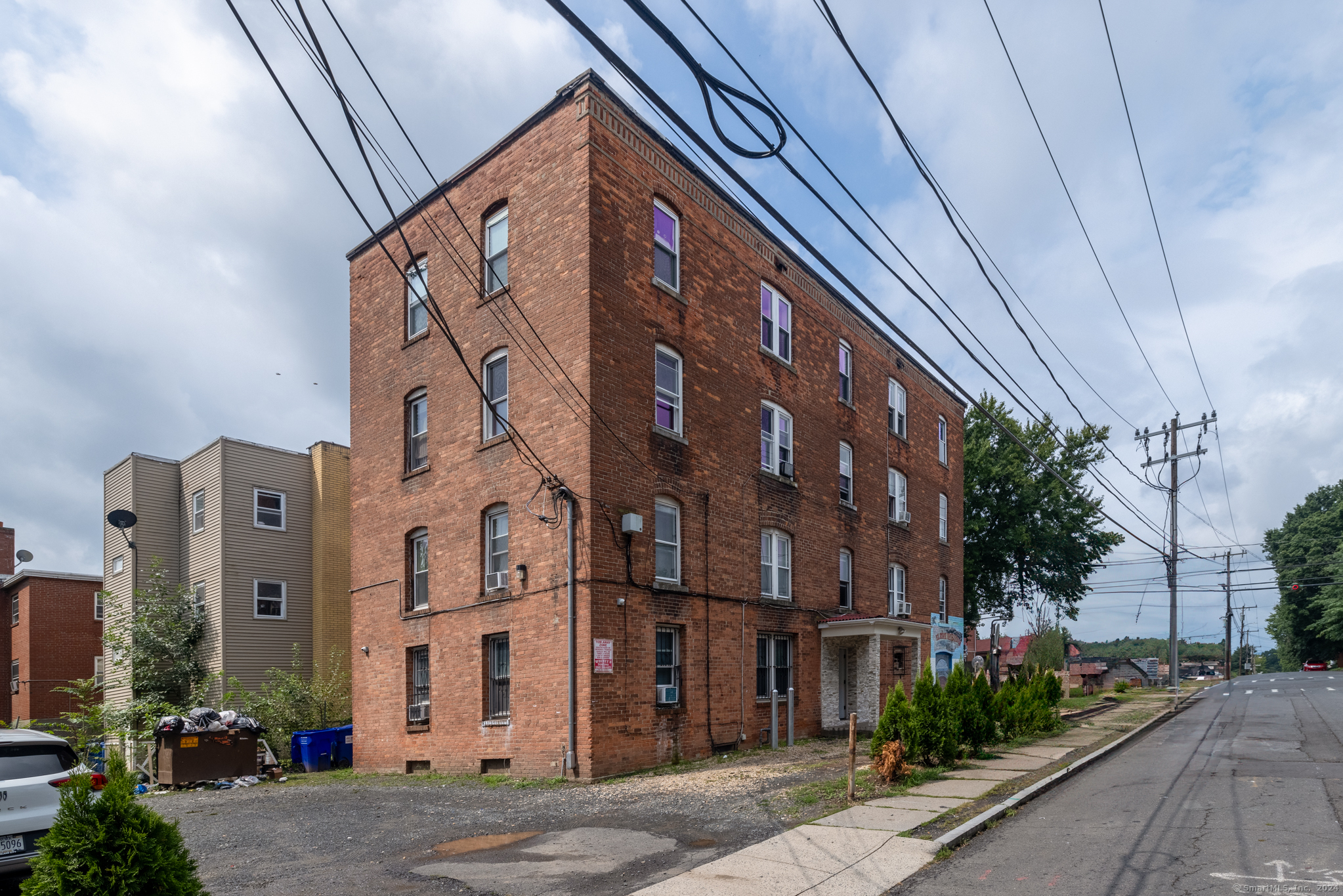 a front view of a building with street view