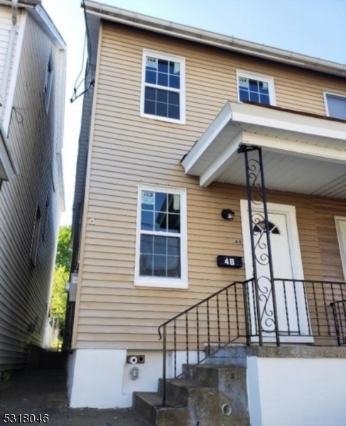 a view of a house with a deck