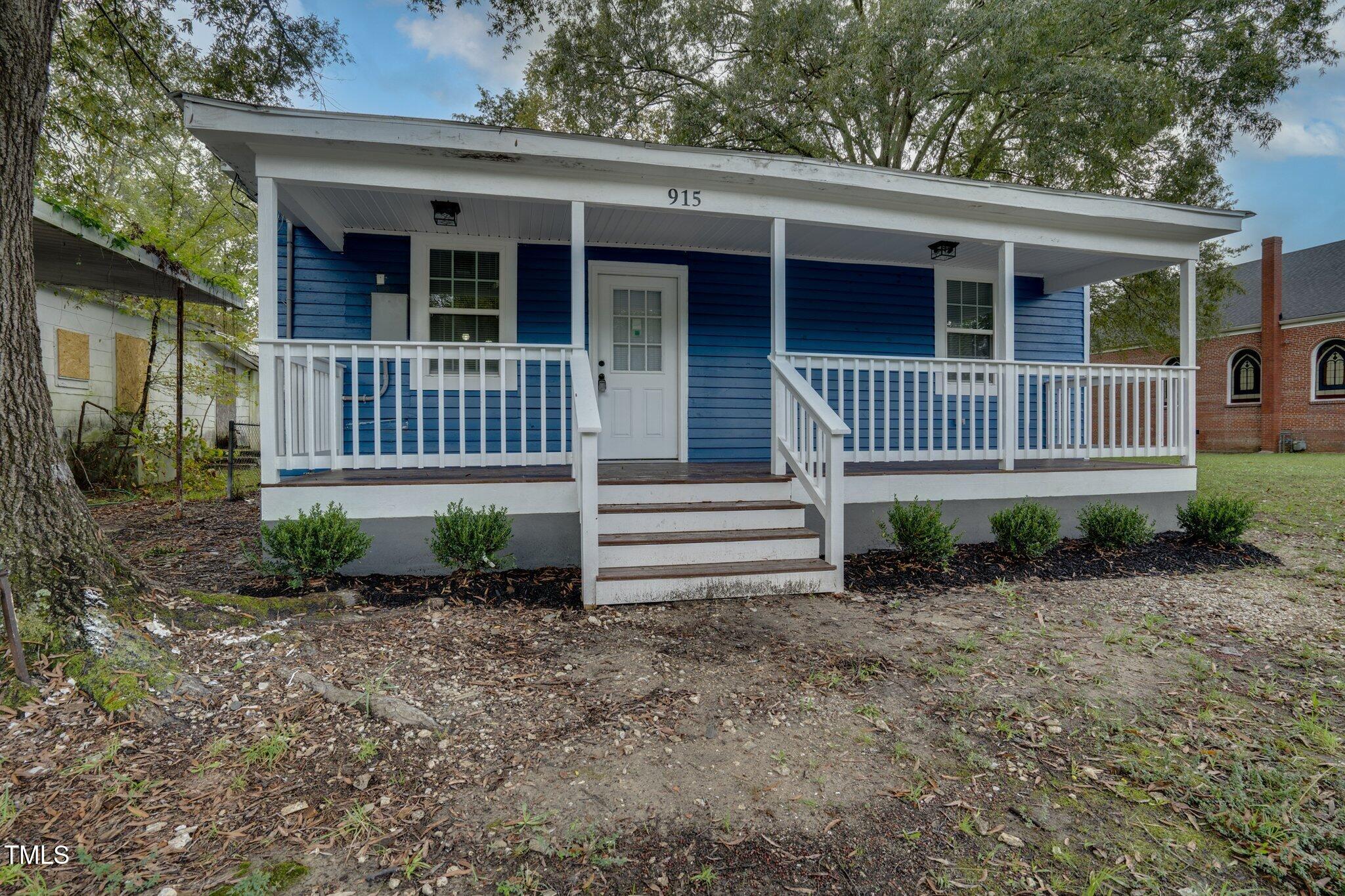 front view of a house with a porch