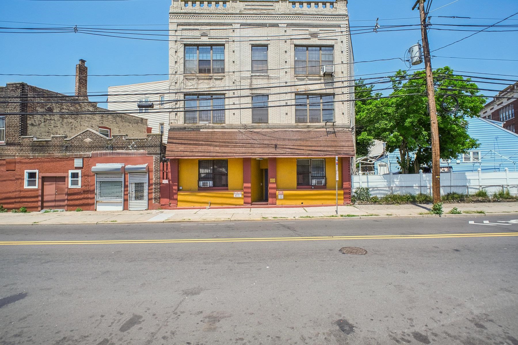 a view of a building with a street