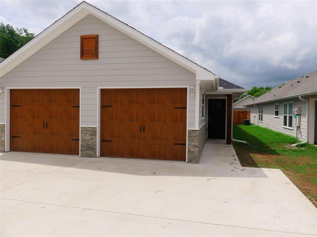 a front view of house with yard