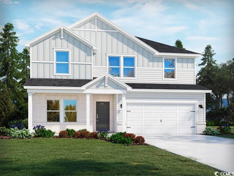 View of front of property with a garage and a fron