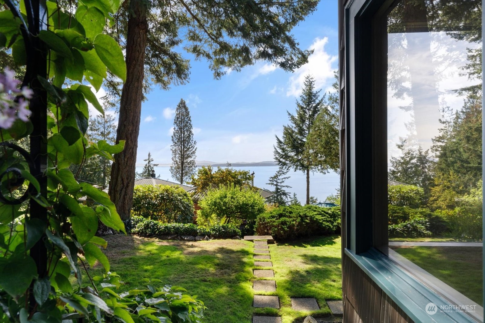 a view of a garden from a balcony