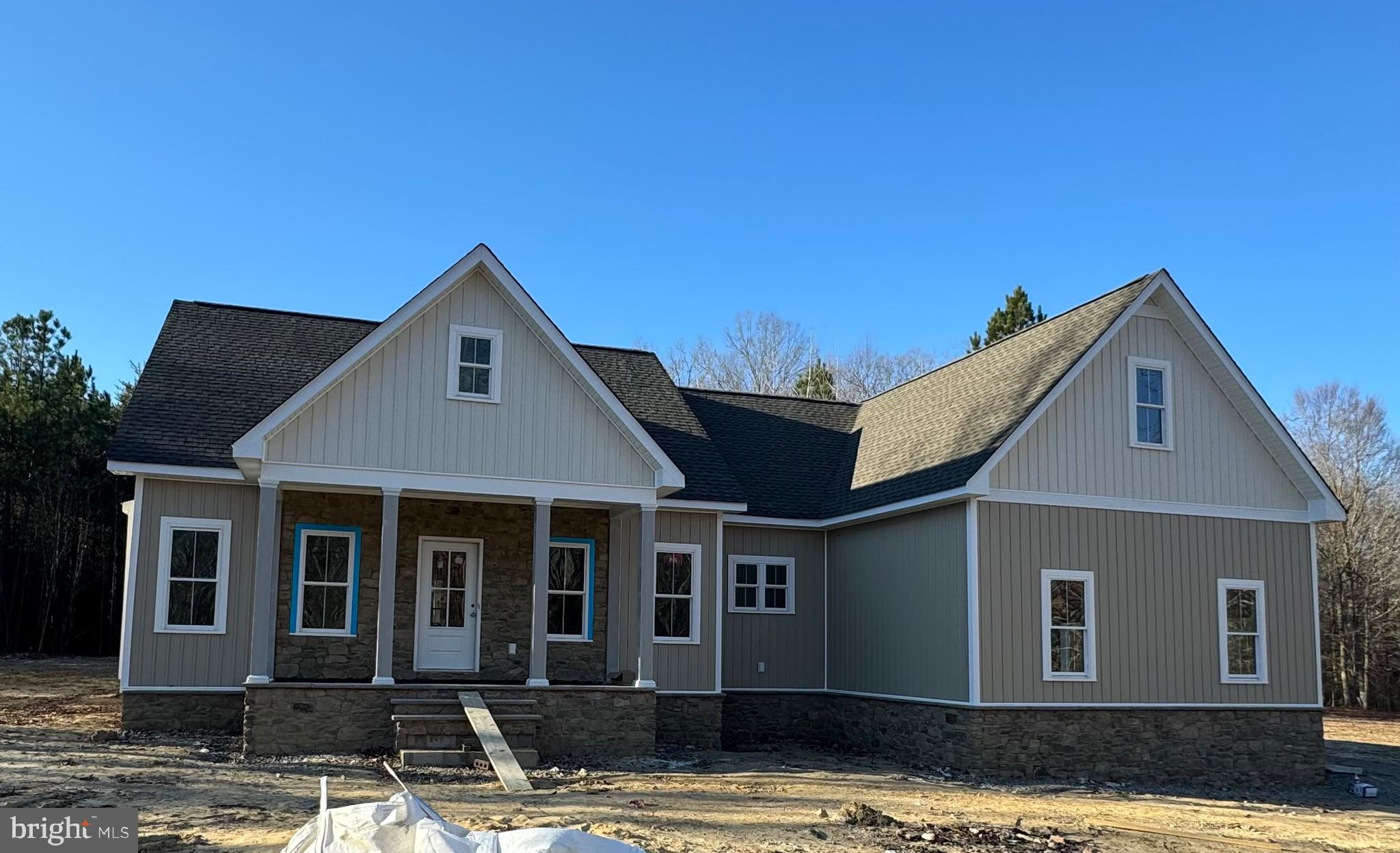 a front view of a house with a garage