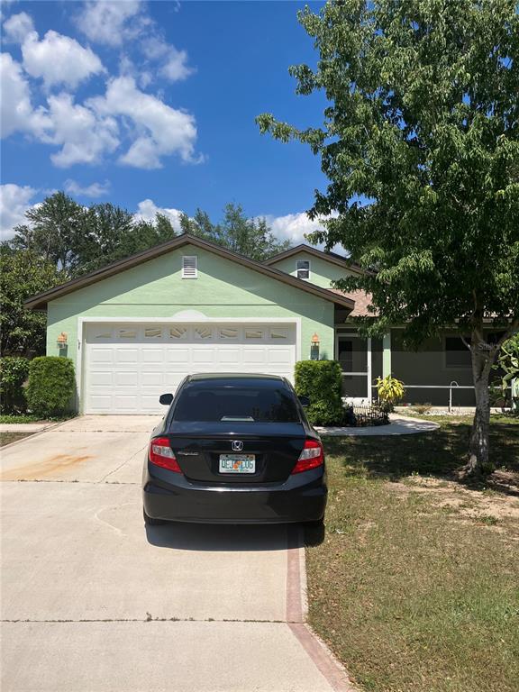 a car parked in front of a house