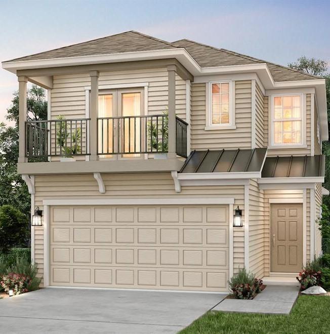 a front view of a house with a yard and outdoor seating