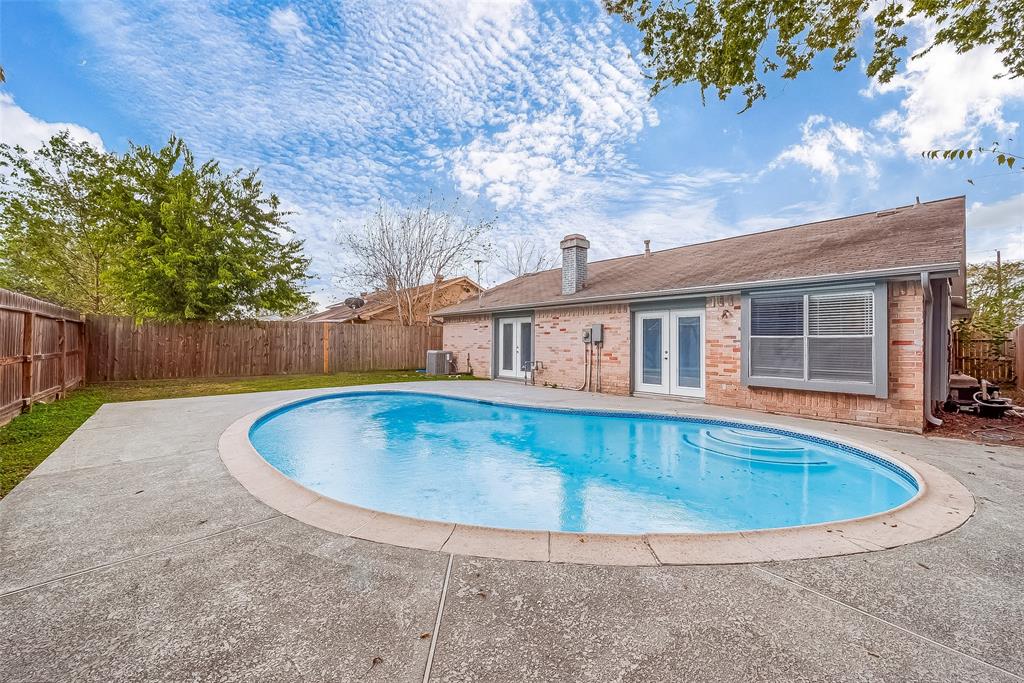 a view of outdoor space yard swimming pool and patio