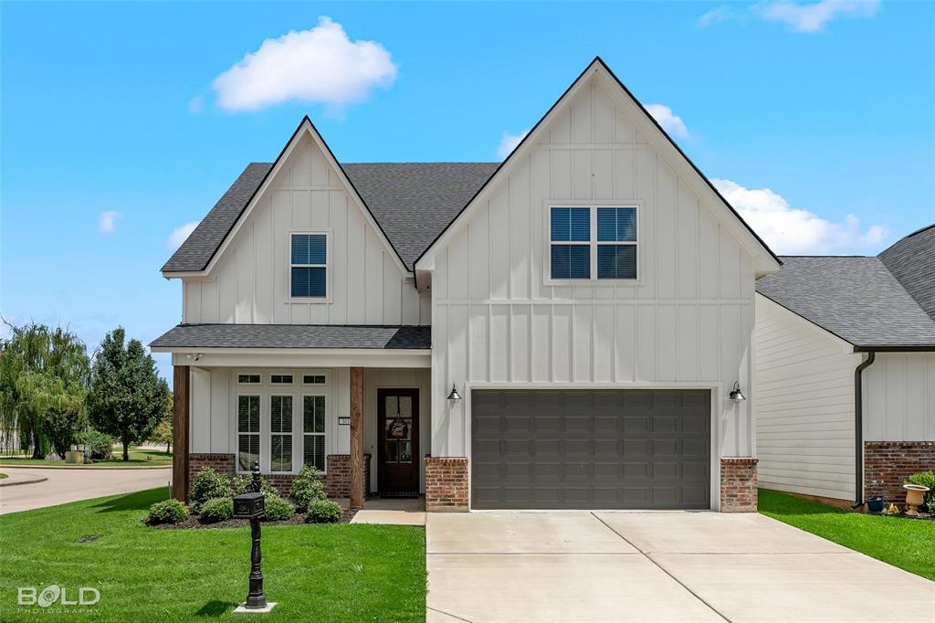 a front view of house with yard