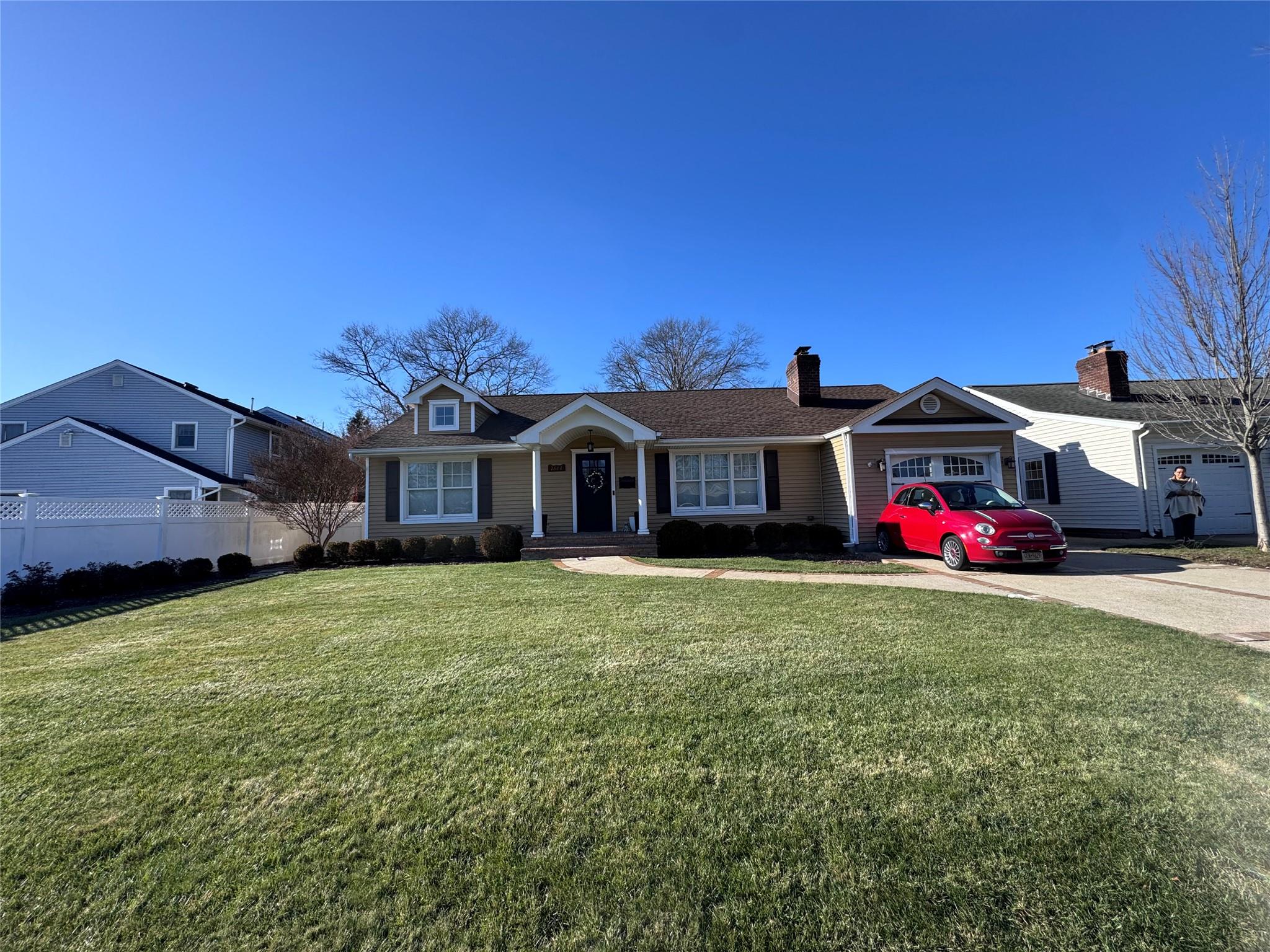 a view of a house with a big yard