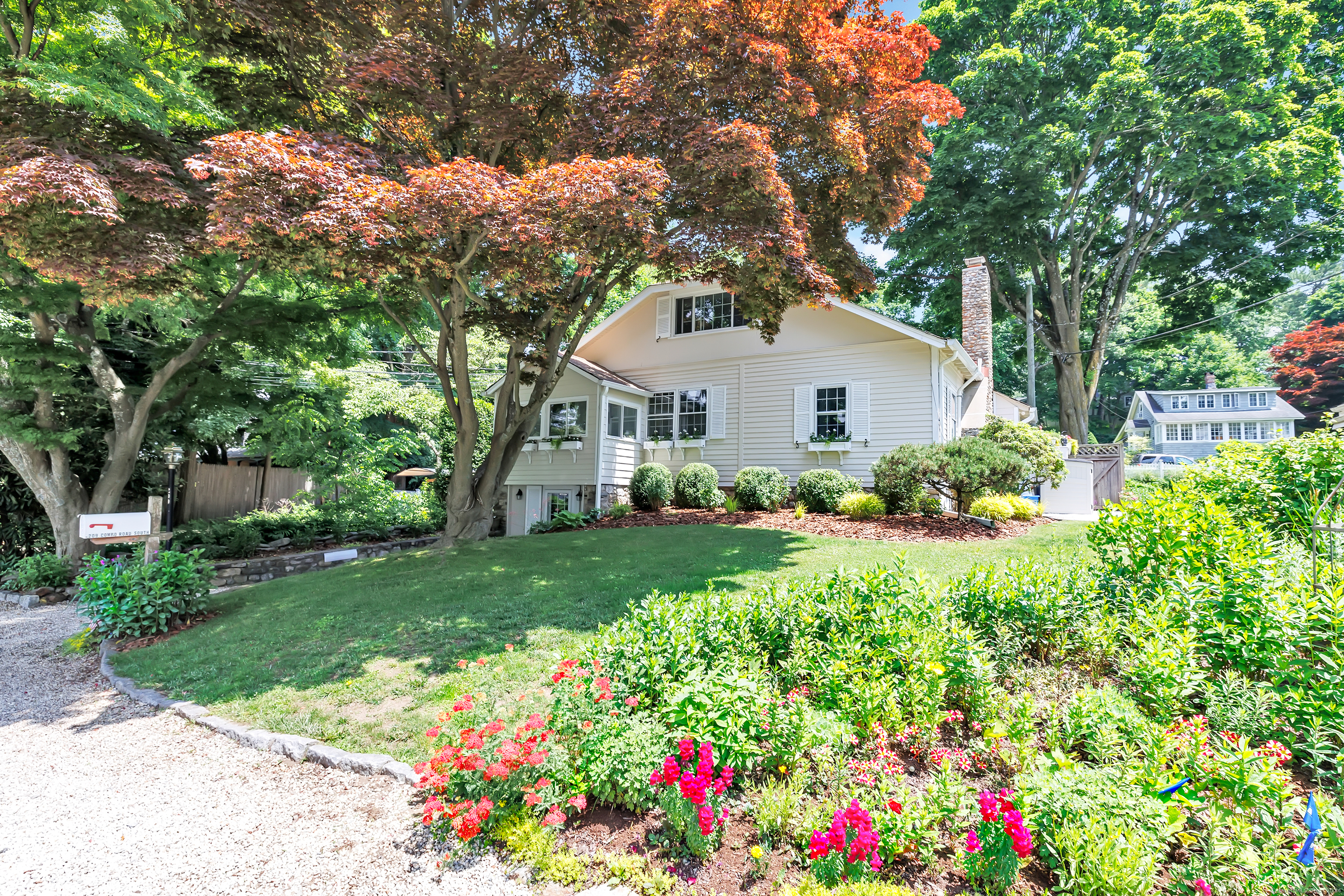 a house view with a garden space