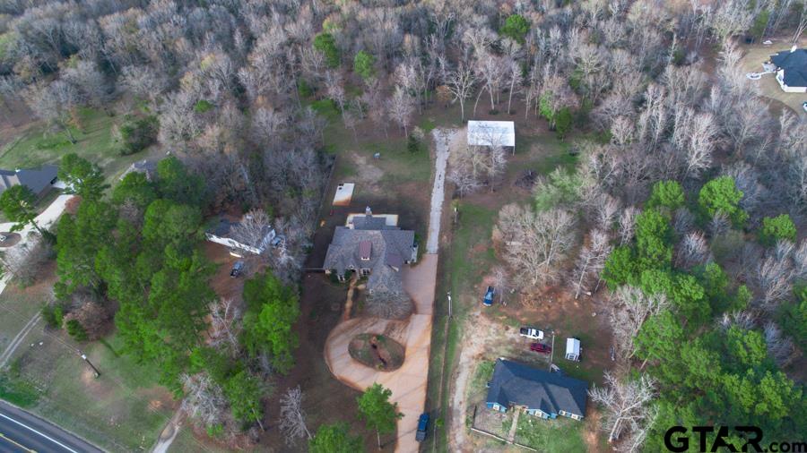 an aerial view of residential house with outdoor space