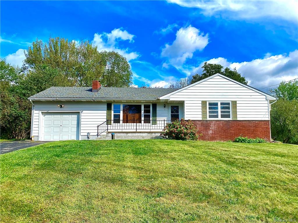 One level home with nice front lawn and garage