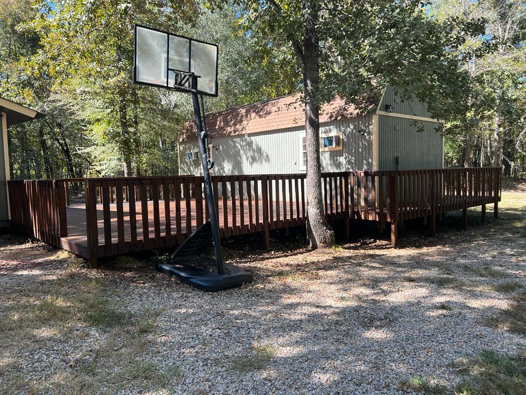 a view of a bench in the backyard