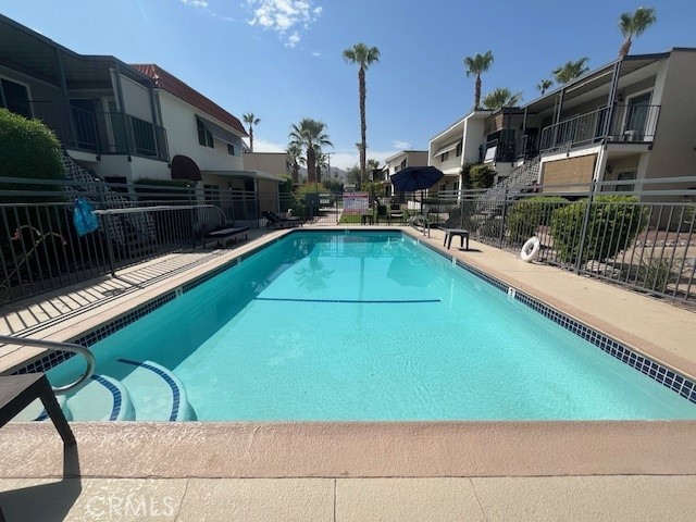 a view of a house with a swimming pool