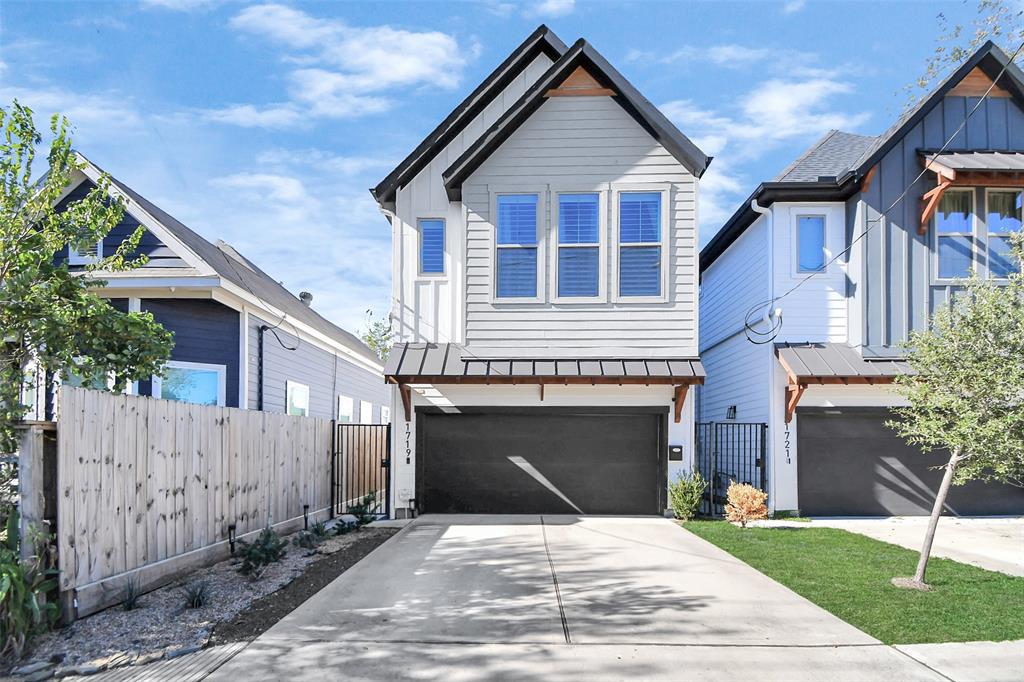 a front view of a house with yard