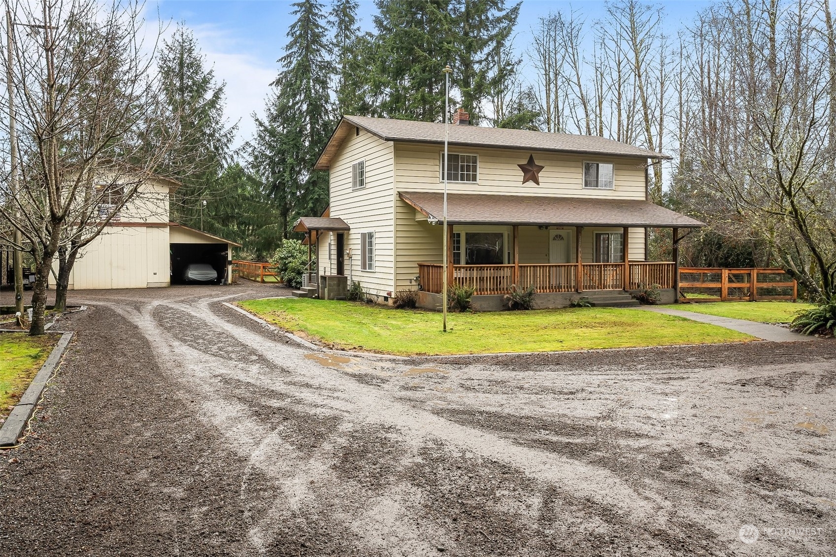 a view of a house with a yard and swimming pool