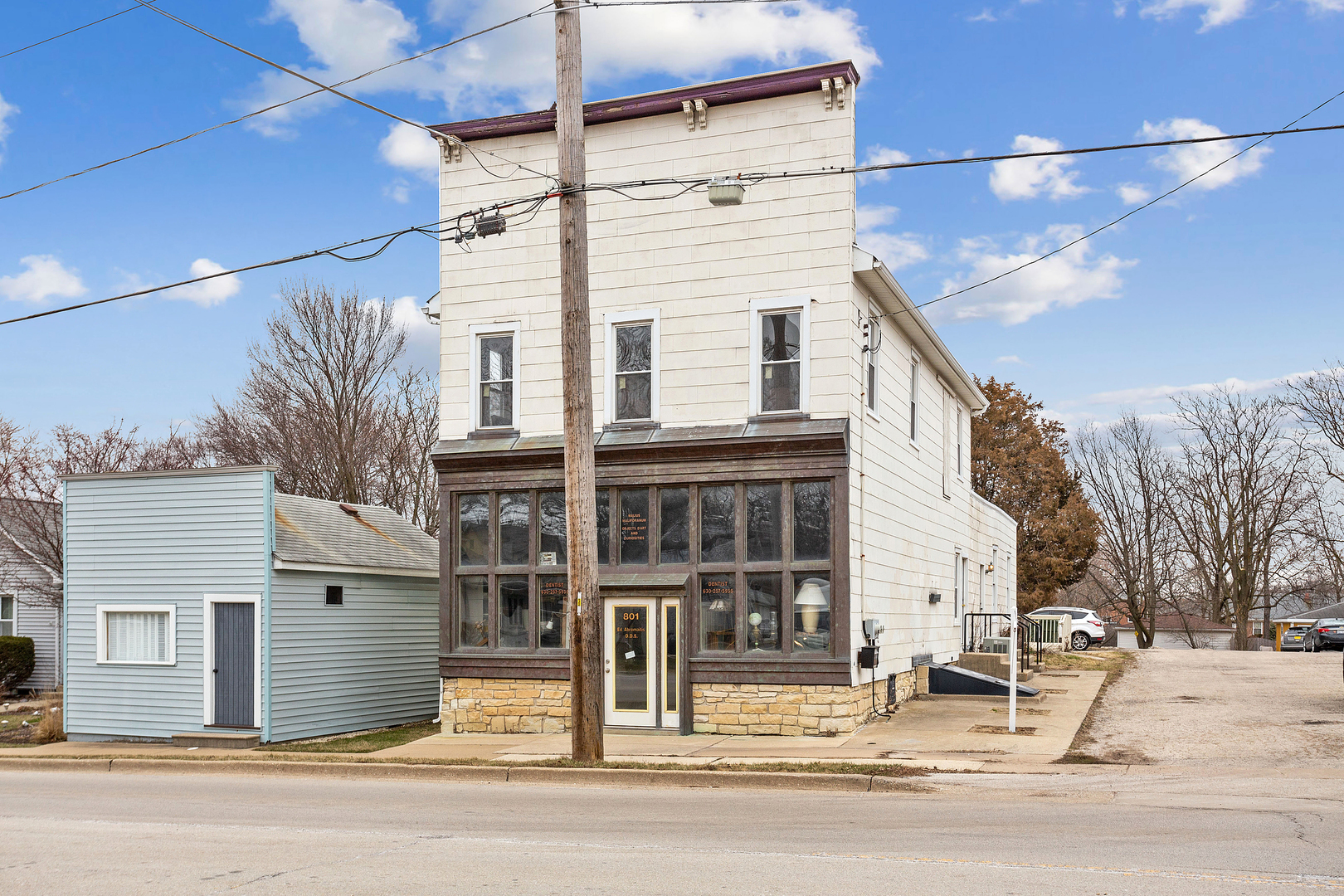 front view of a house with a street