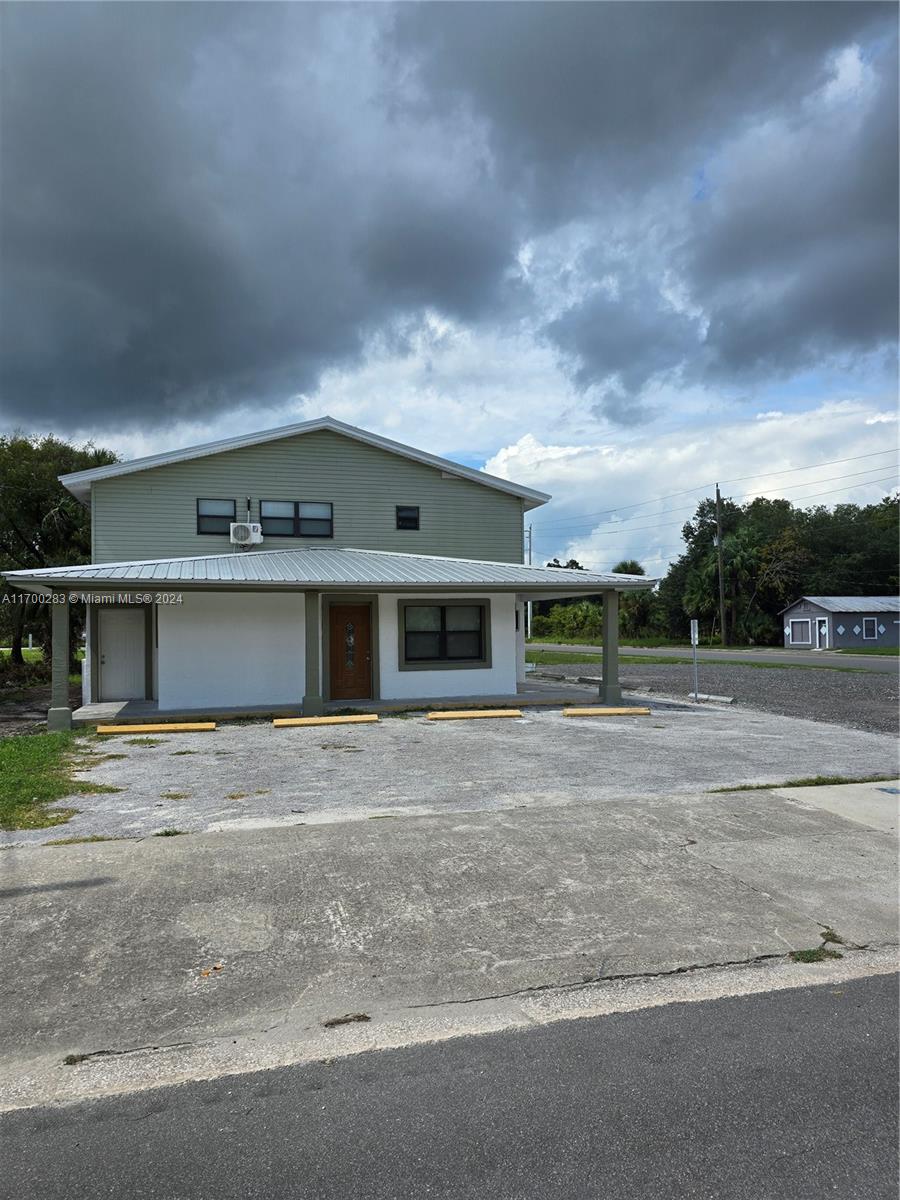 a front view of house with yard