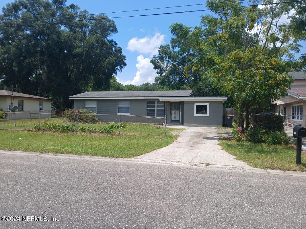 a view of house with outdoor space and street view