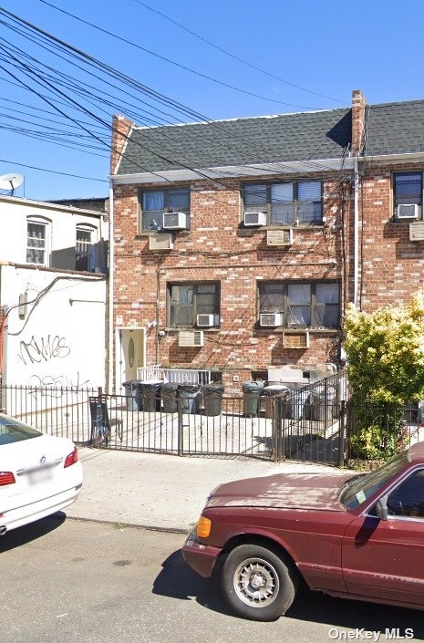 a front view of a house with parking