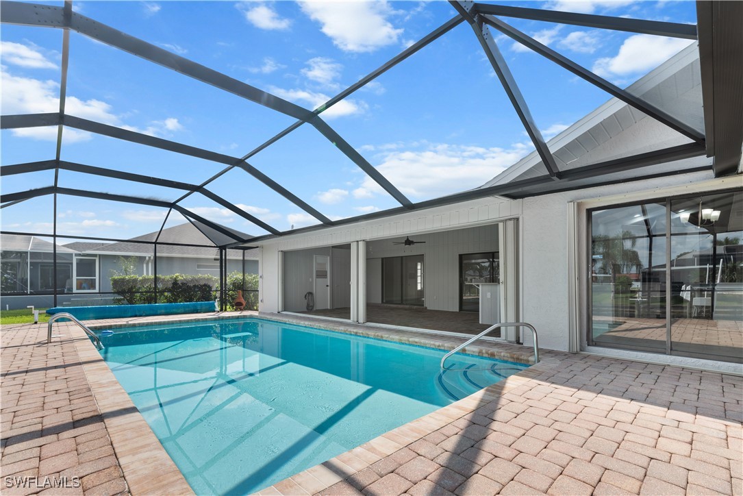 a view of a house with a swimming pool