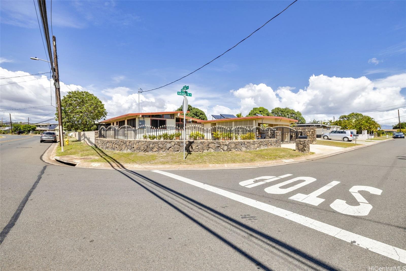 a view of a street with houses